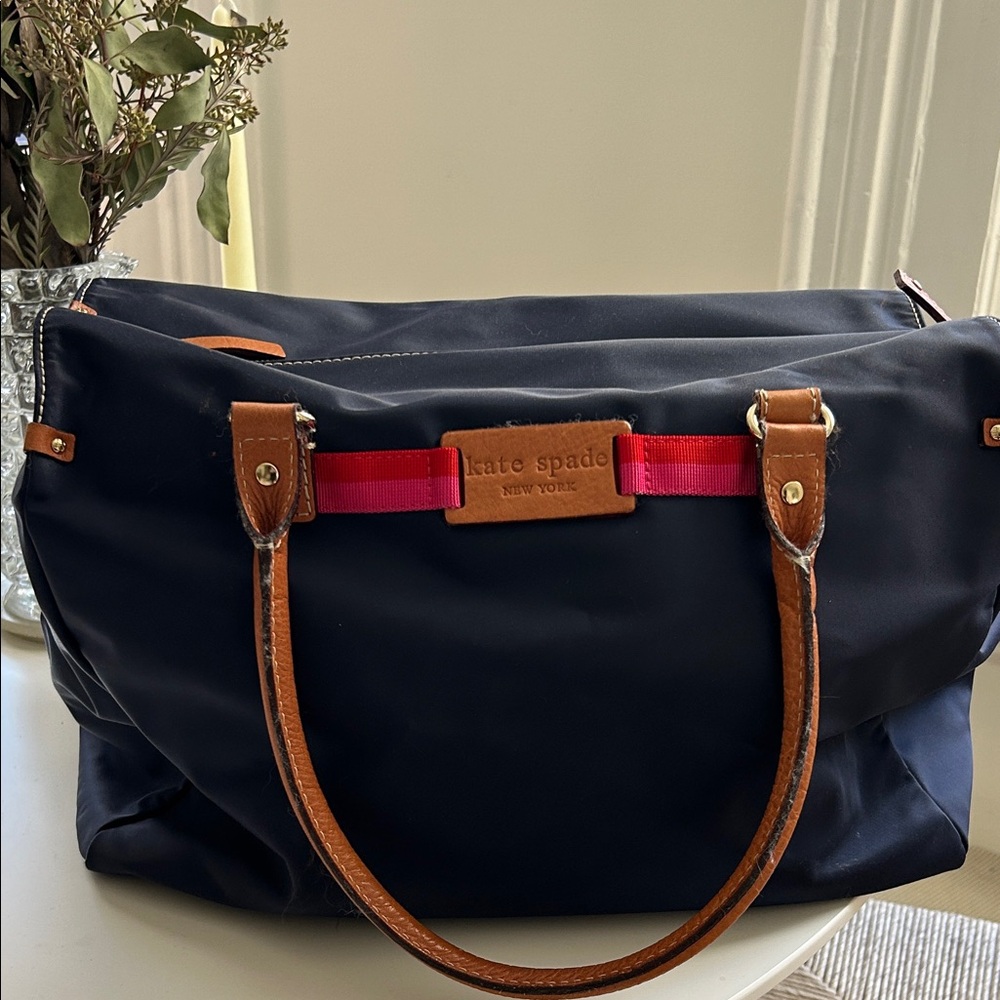 Kate Spade Navy overnight tote with leather handles and pink/Red Accents